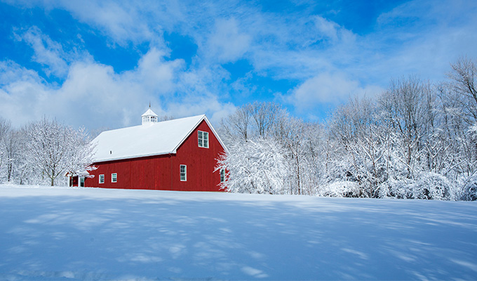 snow on barn