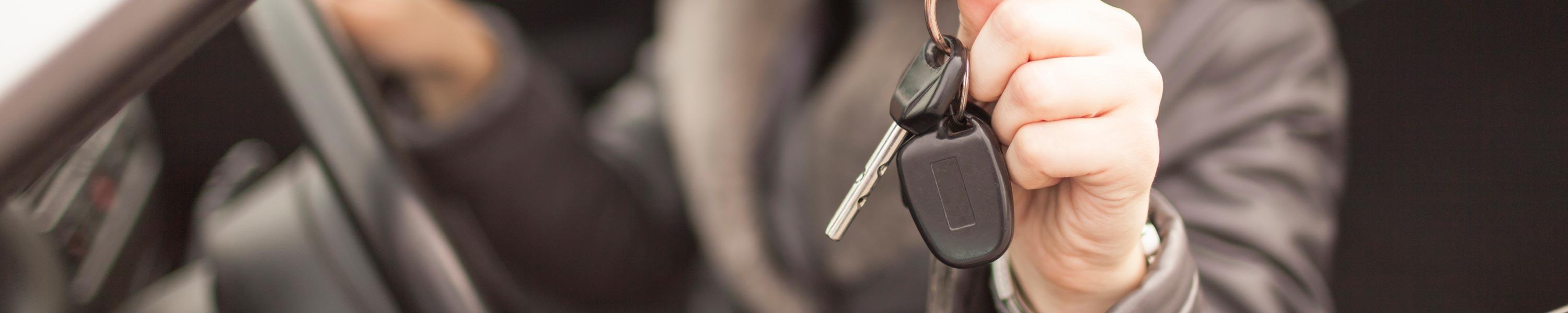 Driver holding Keys