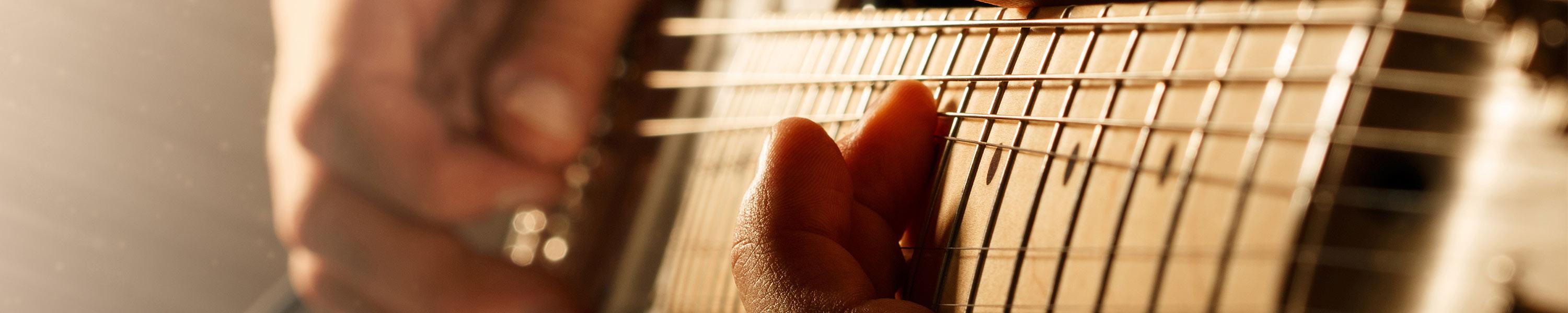 man playing guitar 