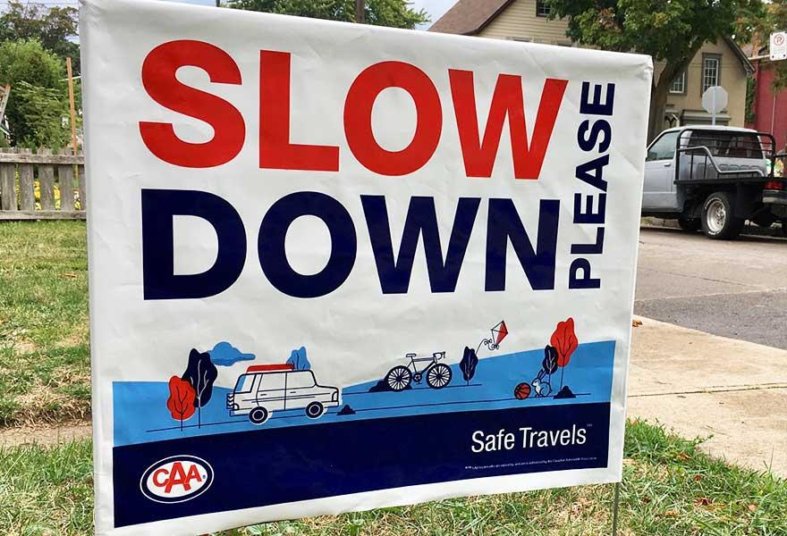 Slow Down Lawn Sign